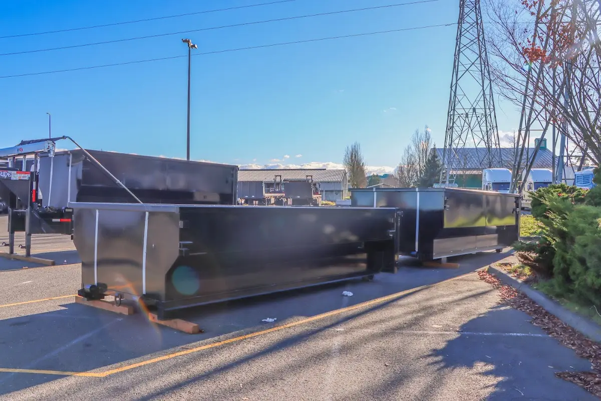 Roll-off dumpster ready for waste disposal at job site for Yard Waste Dumpster Rental in Dranesville